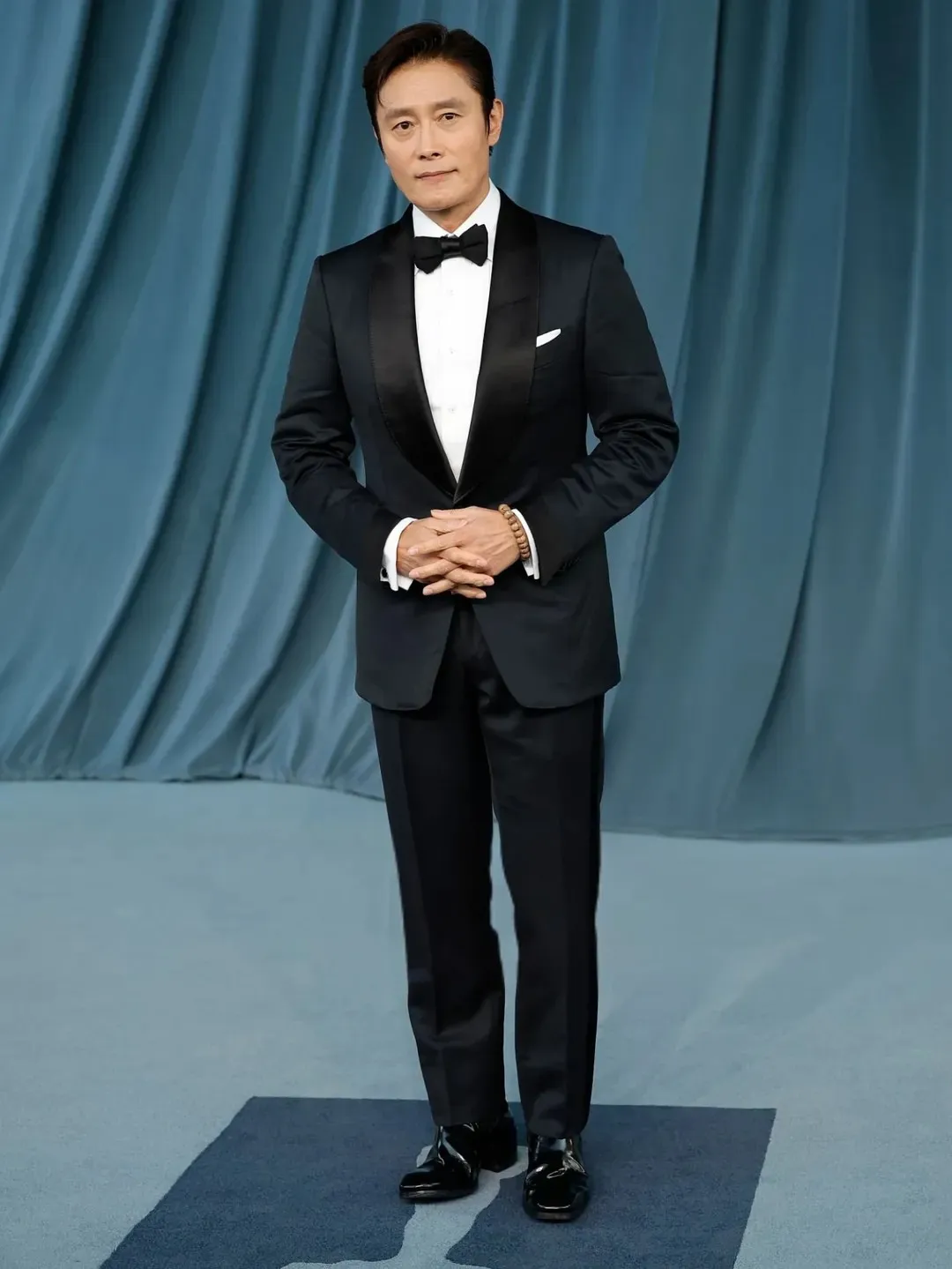 Lee Byung-hun Exudes Front Man Charisma in a Classic Black Tuxedo